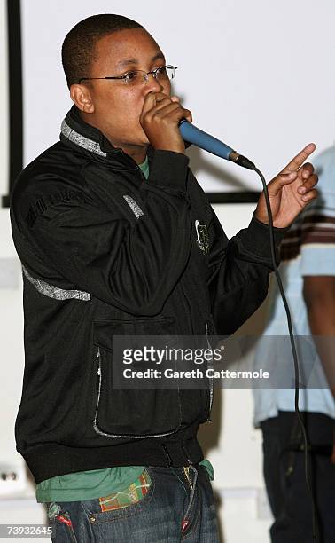 British grime crew Roll Deep perform live and take part in discussion with pupils about fighting racism at Robert Clack School on April 20, 2007 in...