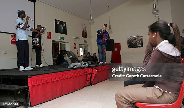 British grime crew Roll Deep perform live and take part in discussion with pupils about fighting racism at Robert Clack School on April 20, 2007 in...