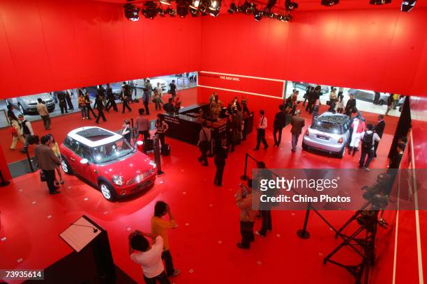 People view BMW sedans during Auto Shanghai 2007 on April 20, 2007 in Shanghai, China. More than 1,300 car makers and car components makers from 20...