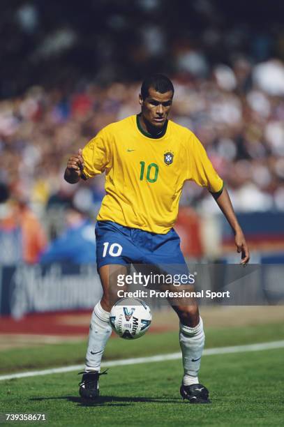 Brazilian professional footballer and forward with the Brazil national football team, Rivaldo pictured with the ball during the International...