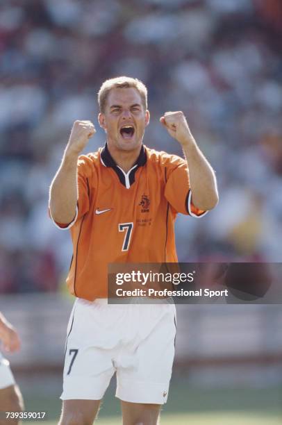 Dutch footballer and defender with the Netherlands national football team, Frank de Boer pictured celebrating during a Netherlands game at the 1998...