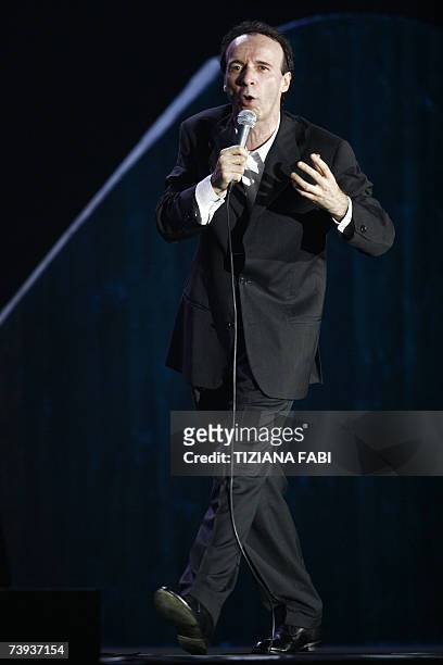 Italian actor and director Roberto Benigni, winner of the oscar in 1999 with the movie La Vita E' Bella, performs on the stage of Teatro Tenda in...
