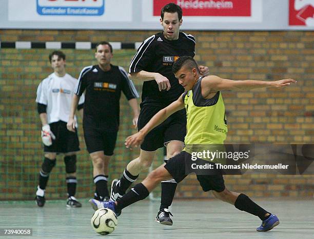 Christopher Vierhaus of Muenster fights for the ball against Musafa Boussuf during the Futsal Cup match between Futsal Panther Muenster and FV bad...