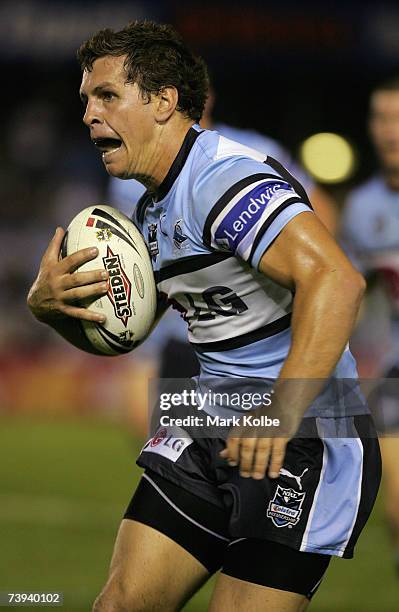 Greg Bird of the Sharks runs the ball at the defence during the round six NRL match between the Cronulla-Sutherland Sharks and the Canberra Raiders...