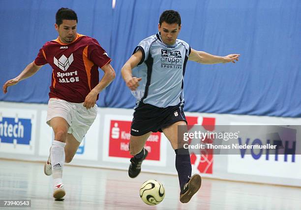 Thomas Mayer of Eppelborn in action with Oliver Romrig of Krefeld during the Futsal Cup match between MSC Strandkaiser Krefeld and FV Eppenborn at...