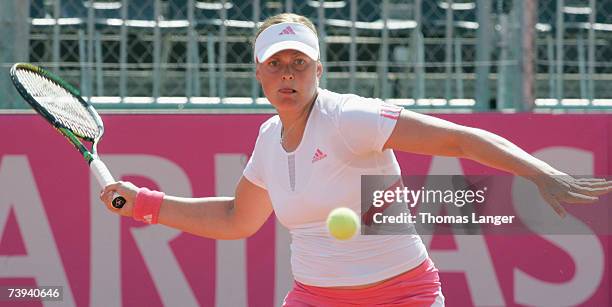Anna-Lena Groenefeld of Germany plays a forehand in her match against Ivana Lisjak of Croatia during the Fed Cup game between Germany and Croatia on...