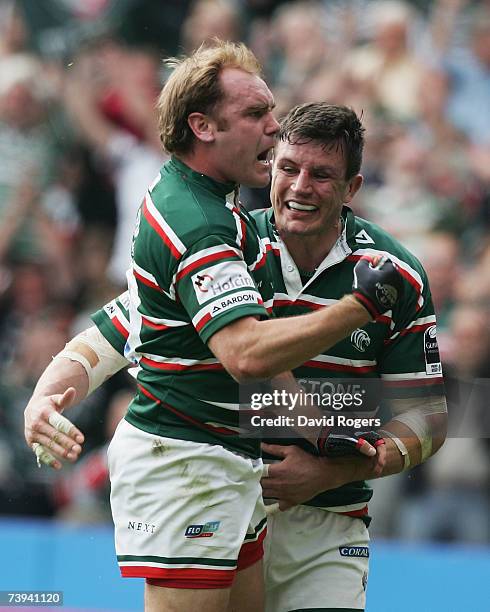 Andy Goode of Leicester celebrates with teammate, Martin Corry after scoring the opening try during the Heineken Cup Semi Final match between...