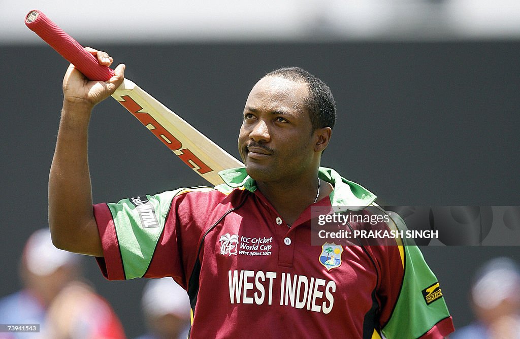 West Indies Captain Brian Lara  walks ba...