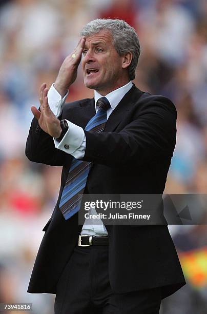 Mark Hughes, manager of Blackburn gives instructions during the Barclays Premiership match between Fulham and Blackburn Rovers at Craven Cottage on...