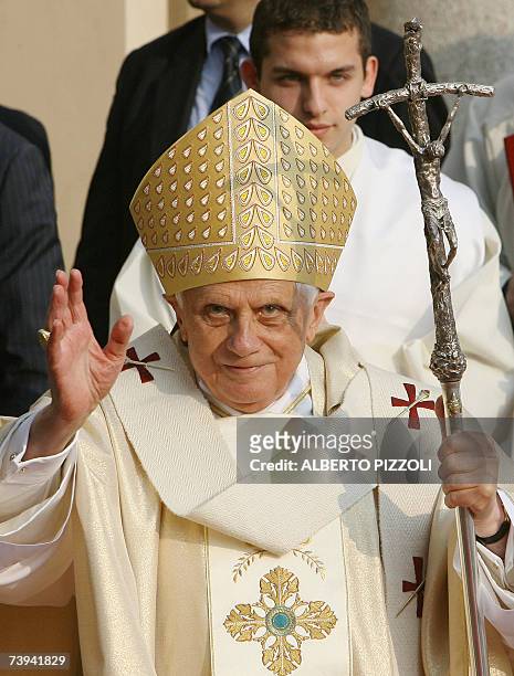 Pope Benedict XVI salutes as he arrives at Ducal square to preside over the mass in Vigevano northern Italy 21 April 2007. The Pontiff pastoral visit...