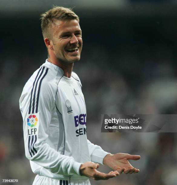 David Beckham of Real Madrid smiles after Sergio Ramos scored Real's second goal during the Primera Liga match between Real Madrid and Valencia at...
