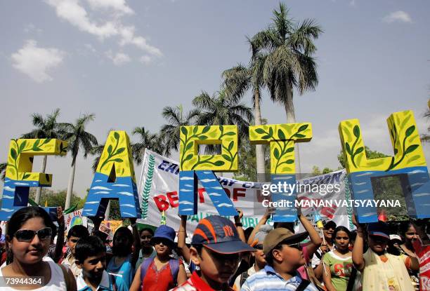 Indian schoolchildren take part in a parade to mark Earth Day in New Delhi, 22 April 2007.The original equinoctial Earth Day is celebrated in most...
