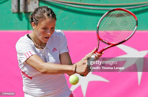 Tatjana Malek of Germany plays a backhand during game against Ivana Lisjak during the Fed Cup game between Germany and Croatia on April 22, 2007 in...