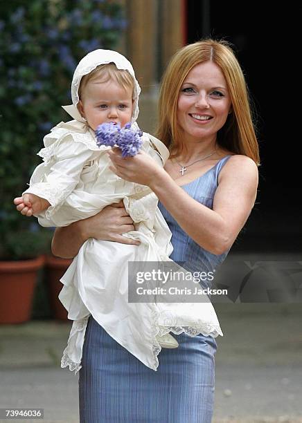 Singer Geri Halliwell poses with her daughter Bluebell Madonna as they arrive for Bluebell's christening at St. Michael's church in Highgate on April...