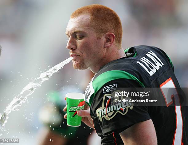 Quarterback Travis Lulay of Berlin Thunder spits out water during the NFL Europe match between Berlin Thunder and Hamburg Sea Devils at the Olympic...