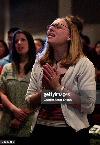 Parishioner is moved by devotion church services held in the student center at Virginia Tech University April 22, 2007 in Blacksburg, Virginia....