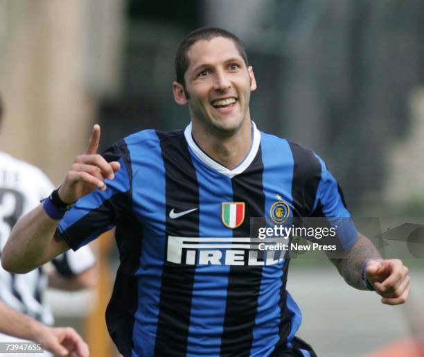 Marco Materazzi celebrates after scoring one of Inter's two goals during the Italian Serie A football match between AC Siena and FC Inter Milan at...