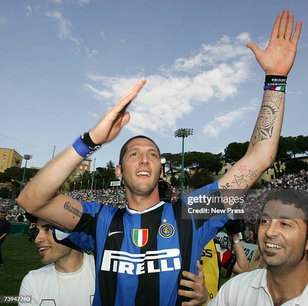 Marco Materazzi , scorer of both goals, celebrates Inter Milan's win of the match and the championship title after the Italian Serie A football match...