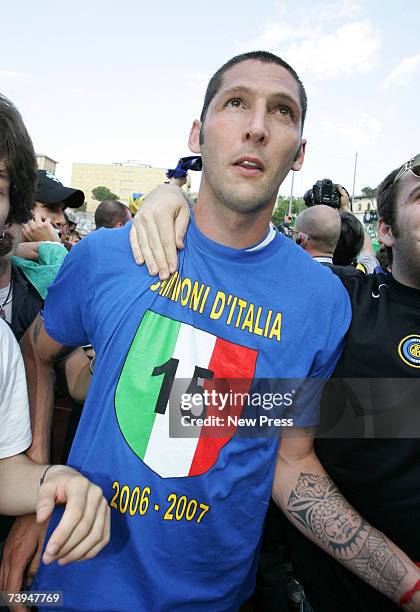 Marco Materazzi, scorer of both goals for Inter Milan, is congratulated by supporters after the Italian Serie A football match between AC Siena and...