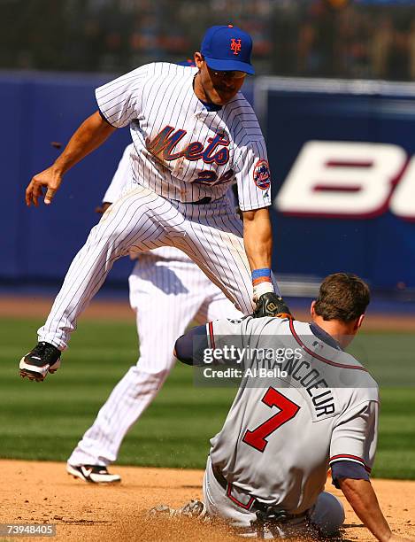 Jose Valentin of the New York Mets tags out Jeff Francoeur of the Atlanta Braves during their game at Shea Stadium April 22, 2007 in the Flushing...