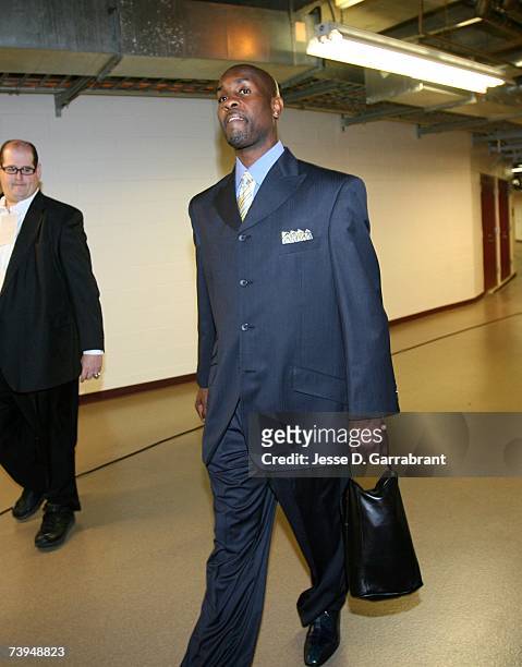 Gary Payton of the Miami Heat arrives at the arena prior to Game One of the Eastern Conference Quarterfinals against the Chicago Bulls during the...