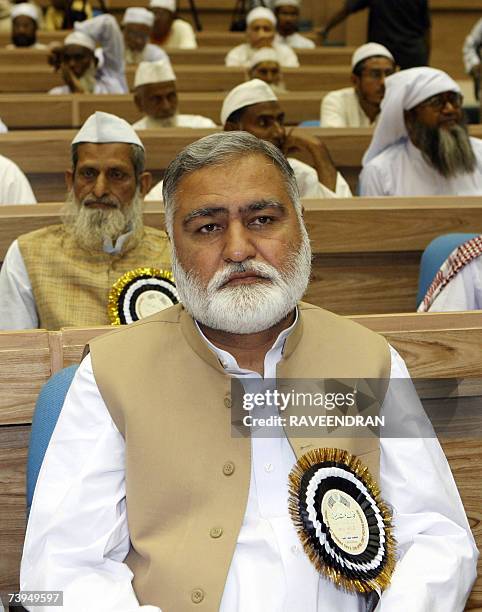 Chief Minister of Pakistan's North West Frontier Province Akram Khan Durrani sits with other delegates as he attends a Fida-e-millat Seminar...