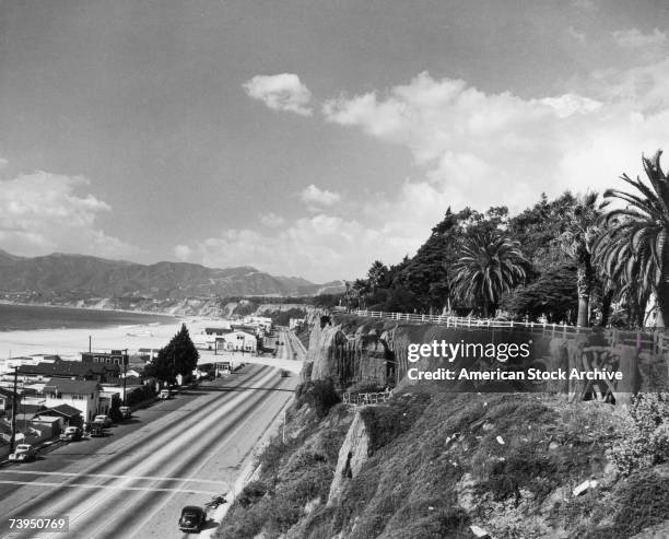 The coastal highway in Santa Monica, California, with the beach on the left and the Palisades Park on the right, circa 1950.
