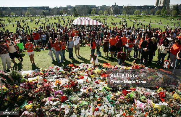 Virginia Tech students gather after marking a moment of silence at a makeshift memorial April 23, 2007 in Blacksburg, Virginia. Virginia Tech...