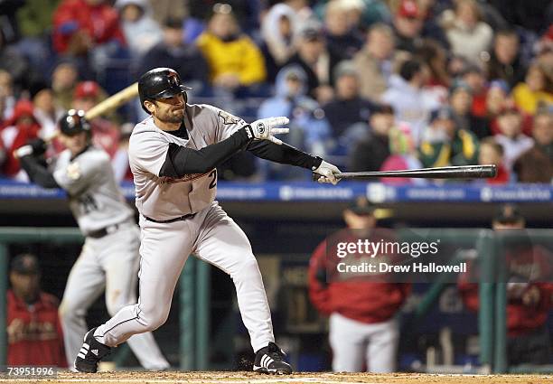 Center fielder Chris Burke of the Houston Astros hits a grand slam during the game against the Philadelphia Phillies on April 13, 2007 at Citizens...