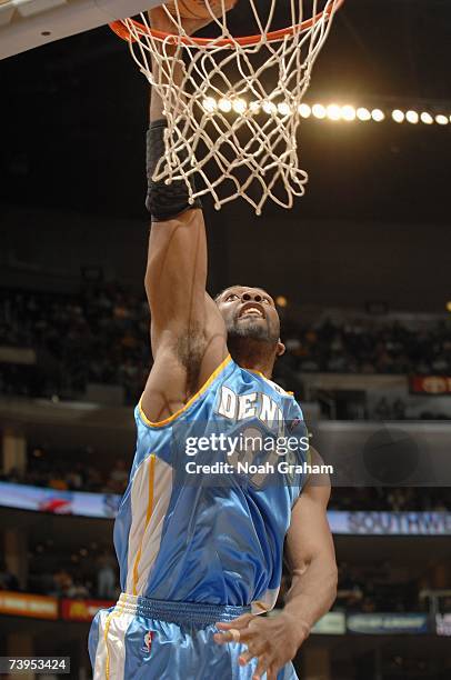 Nene of the Denver Nuggets dunks during the NBA game against the Los Angeles Lakers at Staples Center on April 3, 2007 in Los Angeles, California....