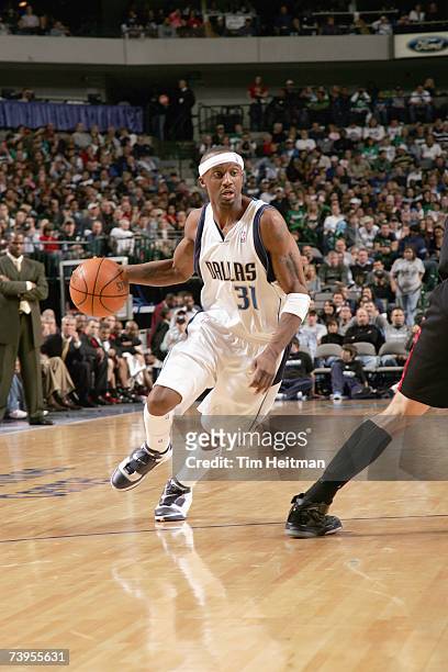Jason Terry of the Dallas Mavericks moves the ball against the Portland Trailblazers during the game at American Airlines Center on April 7, 2007 in...