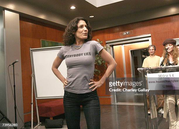Actress Lisa Edelstein models at the announcement of the creation of exclusive ''House-ism'' t-shirts to benefit the National Alliance on Mental...
