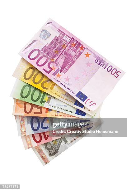 fanned euro notes - five hundred euro banknote stock pictures, royalty-free photos & images