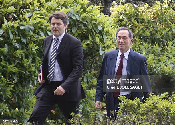 Claude Gueant , the campaign director of French right-wing UMP presidential candidate Nicolas Sarkozy and Franck Louvrier, his communication advisor,...
