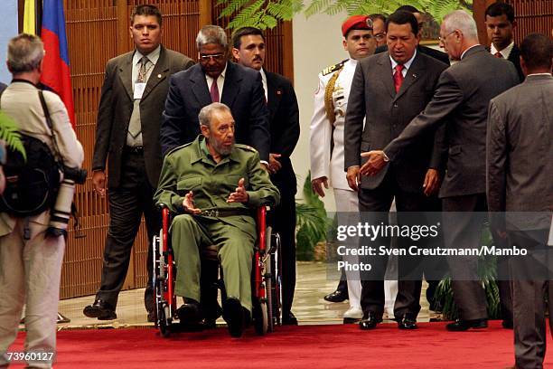 Cuban President Fidel Castro sits in the State Council prior to awarding China's President Hu Jintao the Jose Marti medal, Cuba's highest...