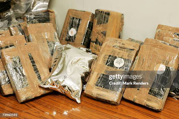 Confiscated bags containing cocaine are displayed at the Brussels Federal Police station on April 24, 2007 in the Belgian capital Brussels. 350 kg of...