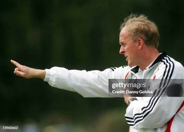 Coach Ralf Peter of Germany gives instructions during the women's Under 17 international friendly match between Germany and Denmark at Waldsportplatz...