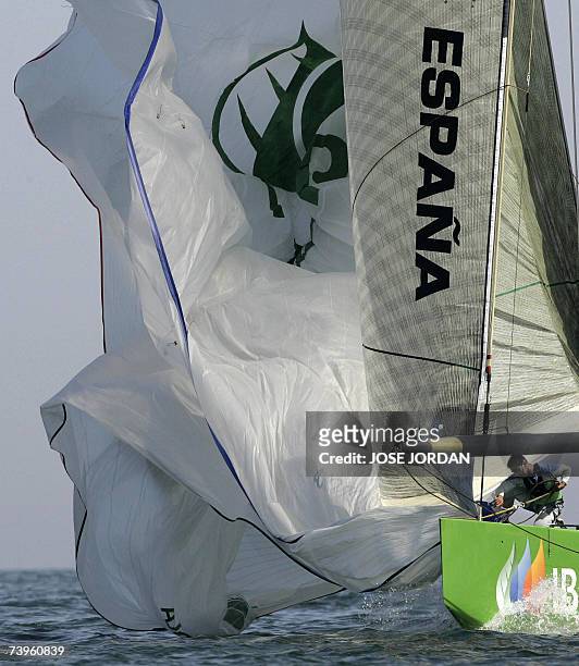 Member of Desafio Espanol hides the spinaker during the 9th day of racing in the challenger selection series of the Louis Vuitton Cup in Valencia, 24...