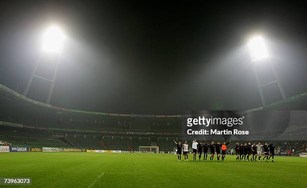 The team of St.Pauli celebrate with the fans after the Third League match between Werder Bremen II and FC St.Pauli at the Weser stadium on April 24,...