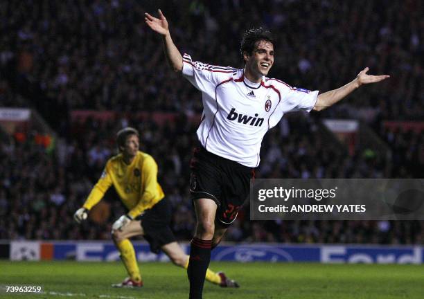 Manchester, UNITED KINGDOM: AC Milan's Brazilian midfielder Ricardo Kaka celebrates scoring his second goal past Manchester United's Dutch goalkeeper...