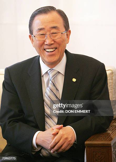 United Nations Secretary General Ban Ki-moon laughs during his meeting with Syria's President Bashar Al-Assad 24 April 2007 at the Presidential...