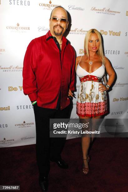 Artist/Actor Ice T and guest Coco attend hip-hop mogul Russell Simmons party for his new book called "Do You" at Stereo on April 24, 2004 in New York...