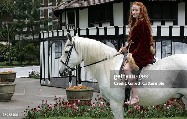 Lady Godiva played by actress Phoebe Thomas rides through Soho Square to promote the new film Lady Godiva Rides Again on April 25, 2007 in London.