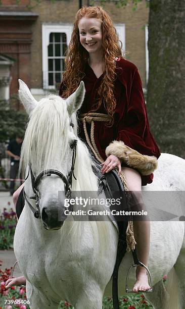 Lady Godiva played by actress Phoebe Thomas rides through Soho Square to promote the new film Lady Godiva Rides Again on April 25, 2007 in London.