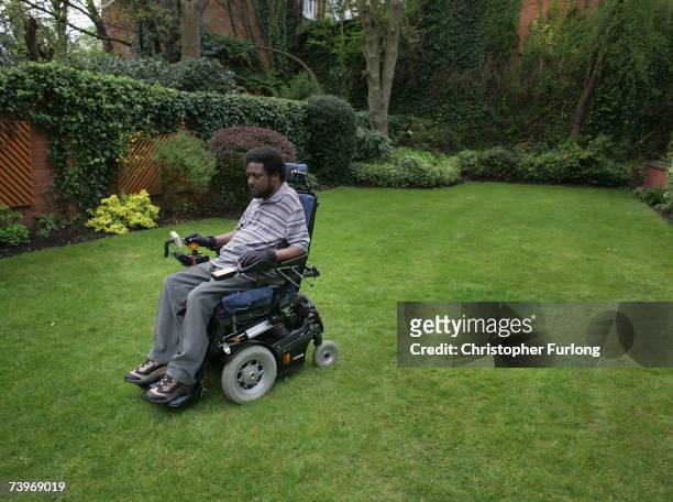 Neo-Nazi attack victim Noel Martin sit in a wheelchair in the garden of his home on April 25 in Birmingham, England. Noel was paralyzed on June 16,...