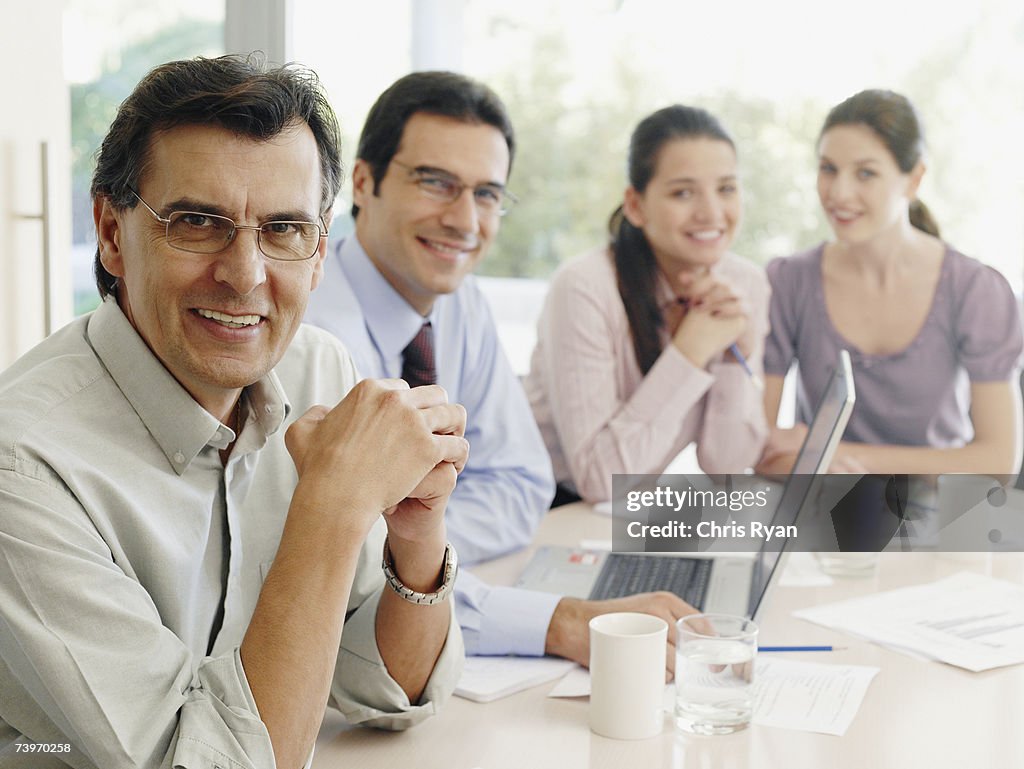 Group of office workers in a meeting