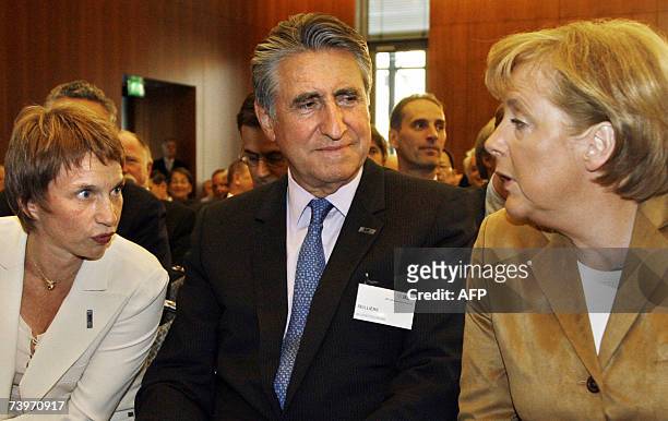 German Chancellor Angela Merkel talks with Laurence Parisot , the leader of the French employers' federation MEDEF, and the President of UNICE , EU's...