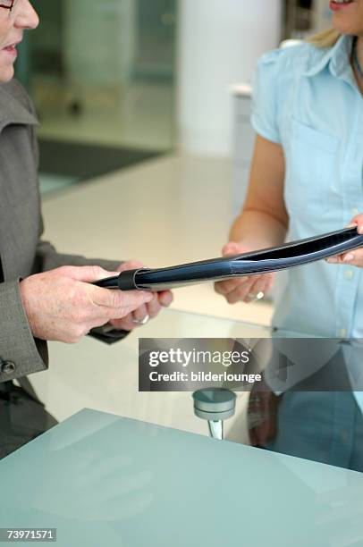 Handing Over File 184 Ceo Of Top Rank Stock Photos, High-Res Pictures, and Images - Getty ...