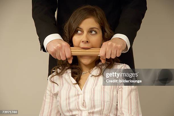 businesswoman strangled by her boss - choking stock pictures, royalty-free photos & images