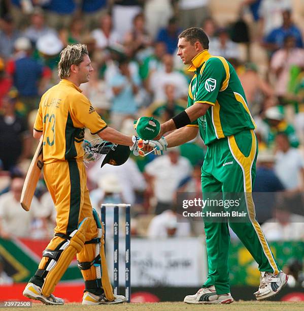 Michael Clarke of Australia shakes hands with Andre Nel of South Africa after Australia defeated South Africa during the ICC Cricket World Cup Semi...